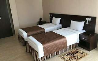 Гостиница Виктория Ставрополь Стандарт с двумя раздельными кроватями, с мини-ванной-1